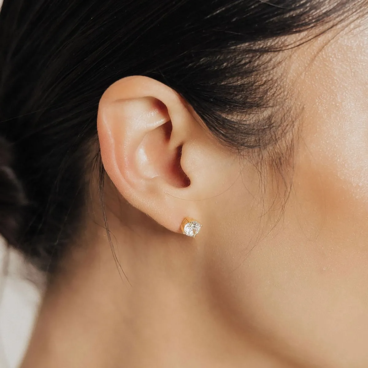 .75 Carat (each) Brilliant CZ Round Stud Earrings in Gold Overlay