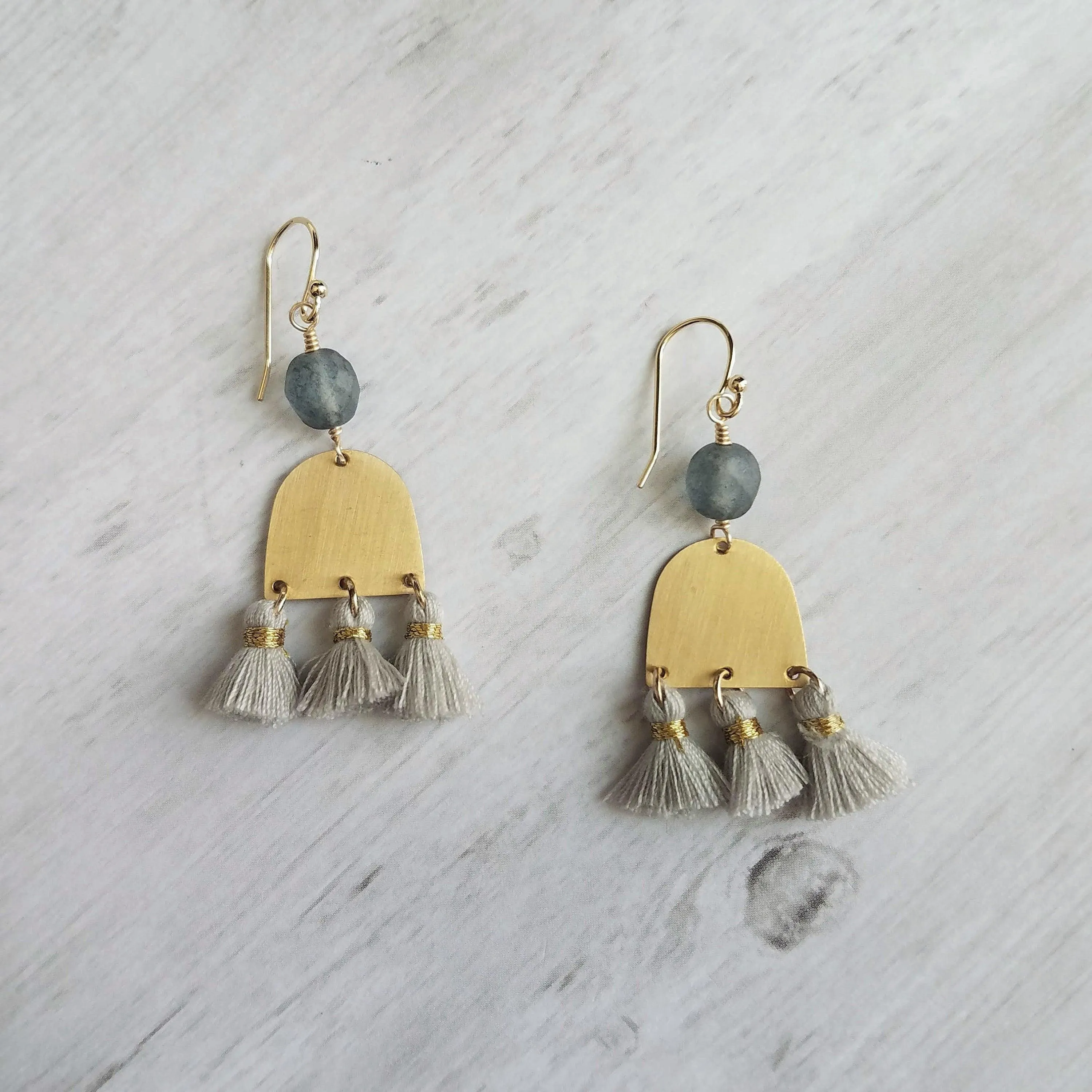 Gold Tassel Earrings, boho earring, grey tassel, small gold dangle, tiny tassel, brass semicircle, smoky blue gray bead, faceted glass bead