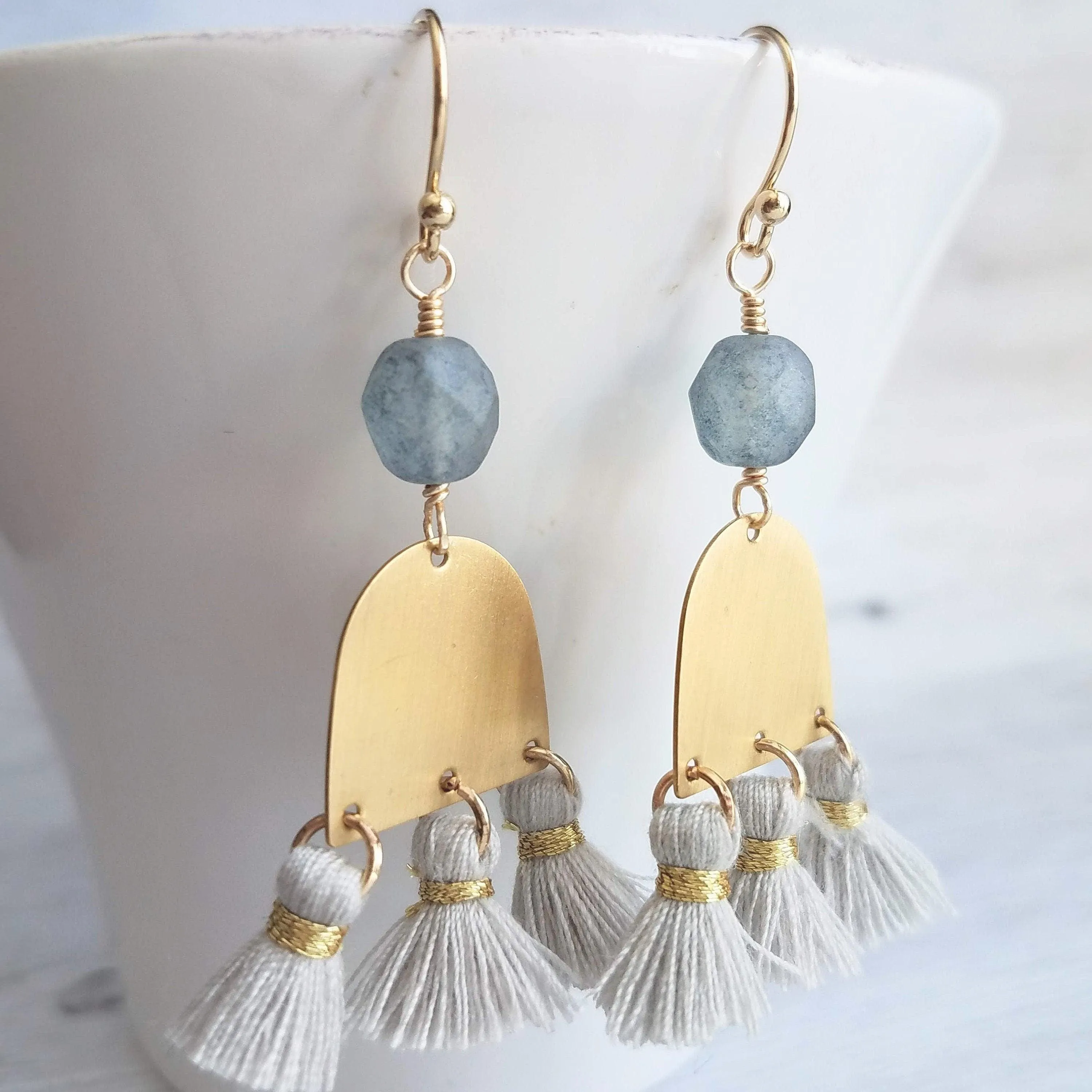 Gold Tassel Earrings, boho earring, grey tassel, small gold dangle, tiny tassel, brass semicircle, smoky blue gray bead, faceted glass bead
