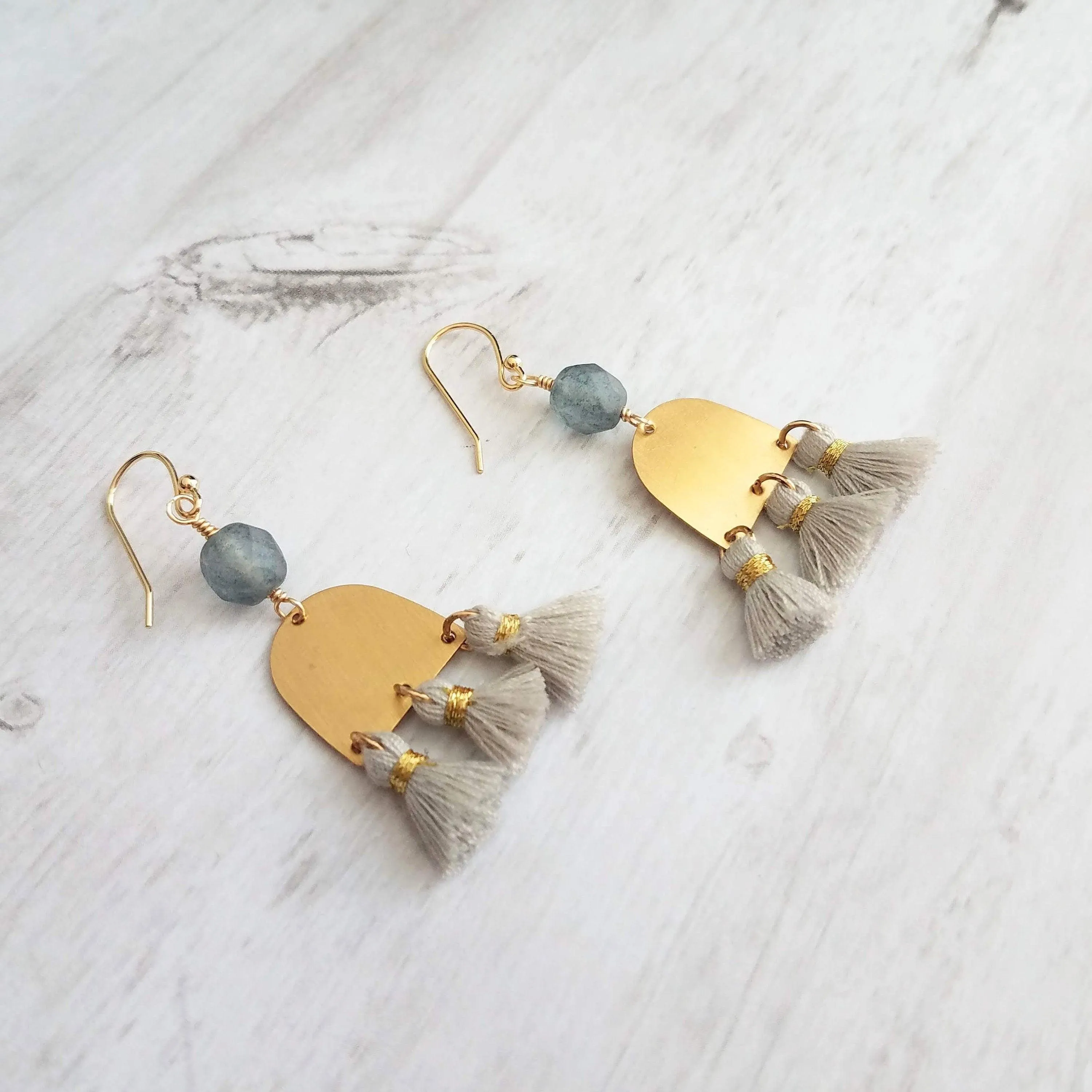 Gold Tassel Earrings, boho earring, grey tassel, small gold dangle, tiny tassel, brass semicircle, smoky blue gray bead, faceted glass bead