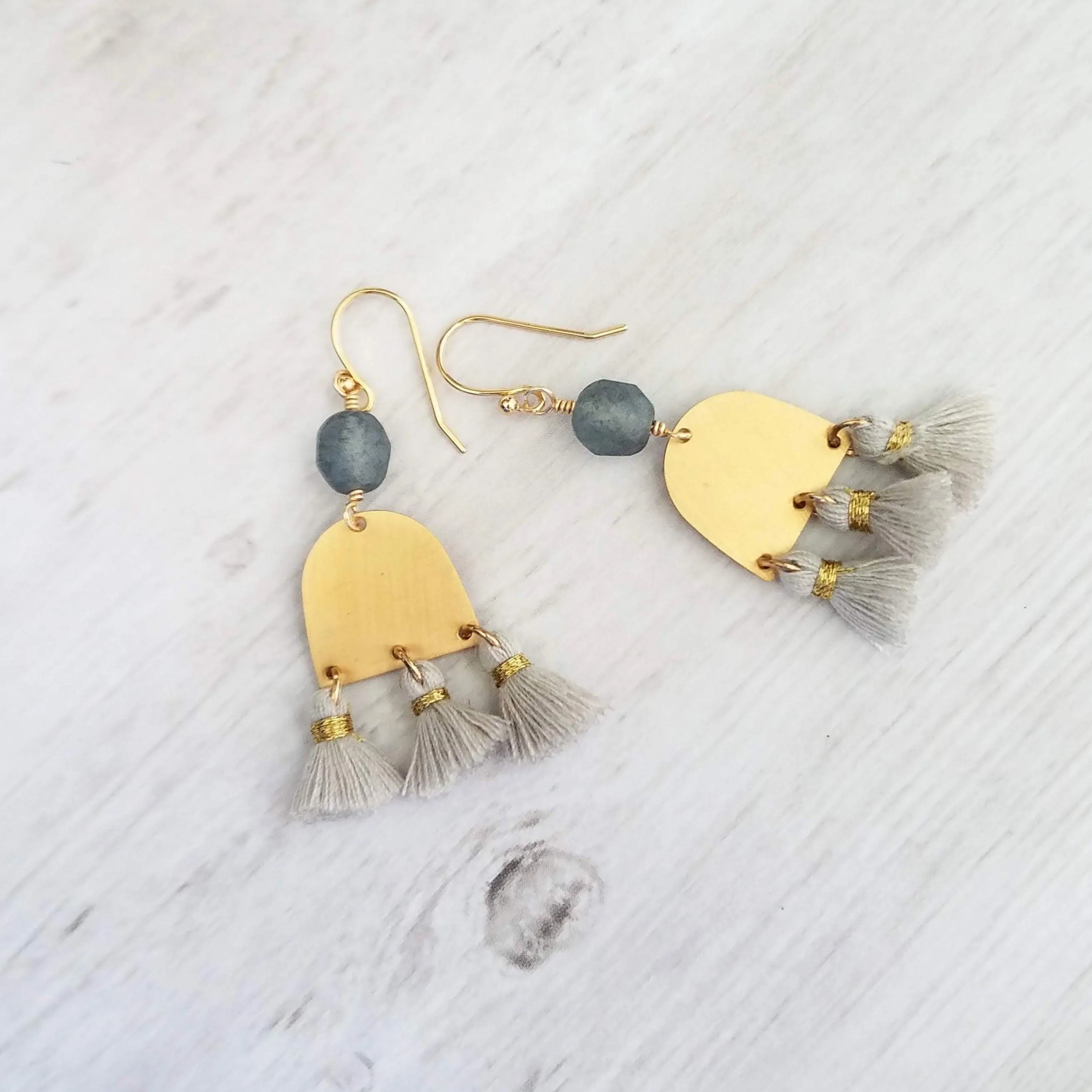 Gold Tassel Earrings, boho earring, grey tassel, small gold dangle, tiny tassel, brass semicircle, smoky blue gray bead, faceted glass bead