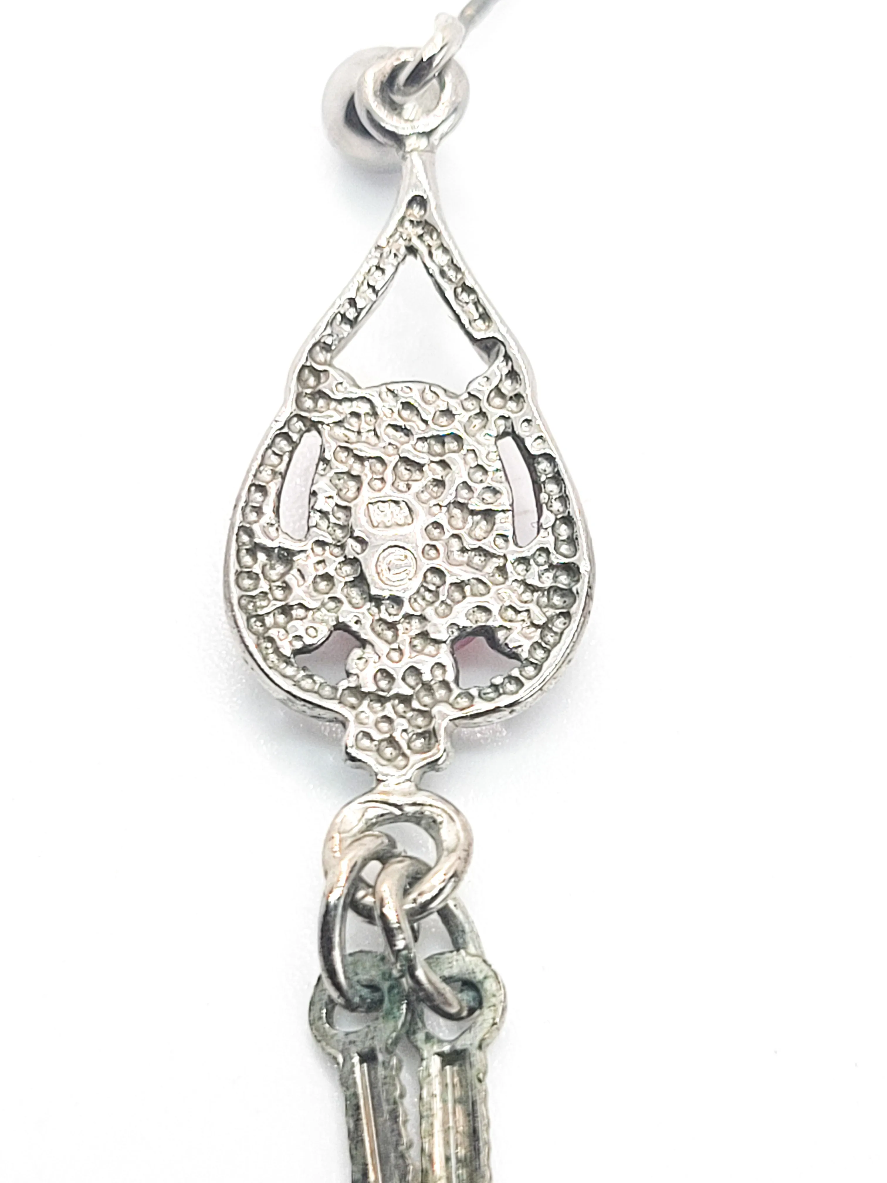 Spiny Oyster Southwestern style sterling silver long drop feather earrings