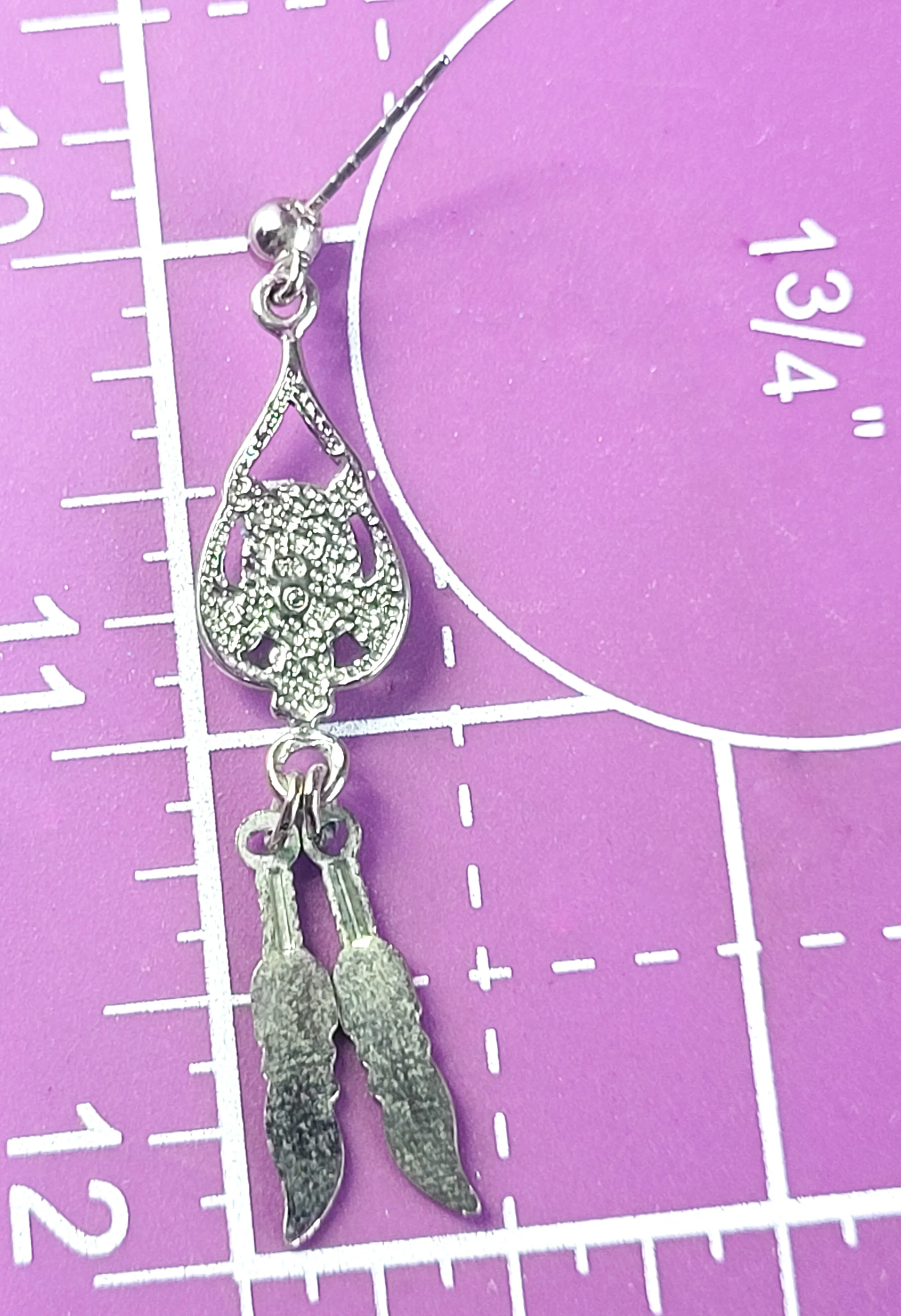Spiny Oyster Southwestern style sterling silver long drop feather earrings