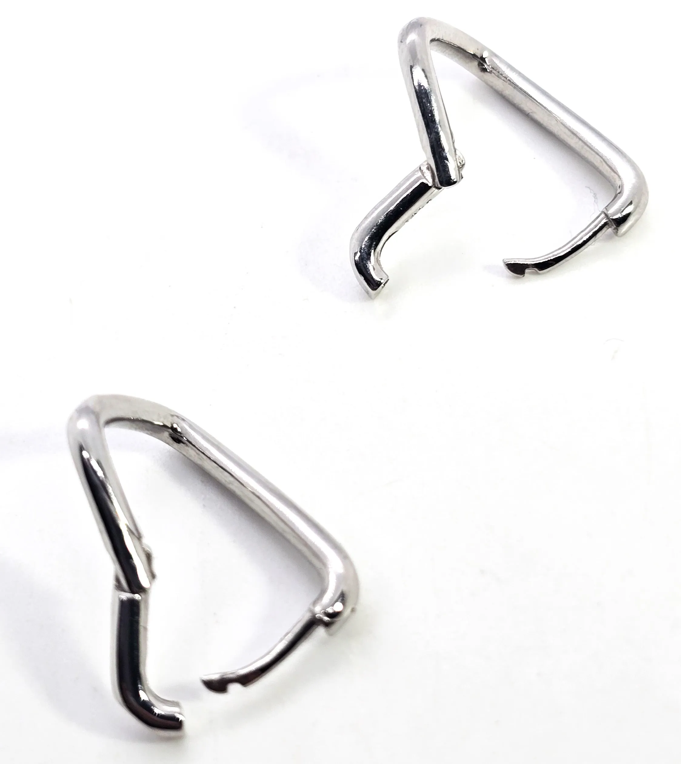 Twisted hoop hinged sterling silver minimalist earrings